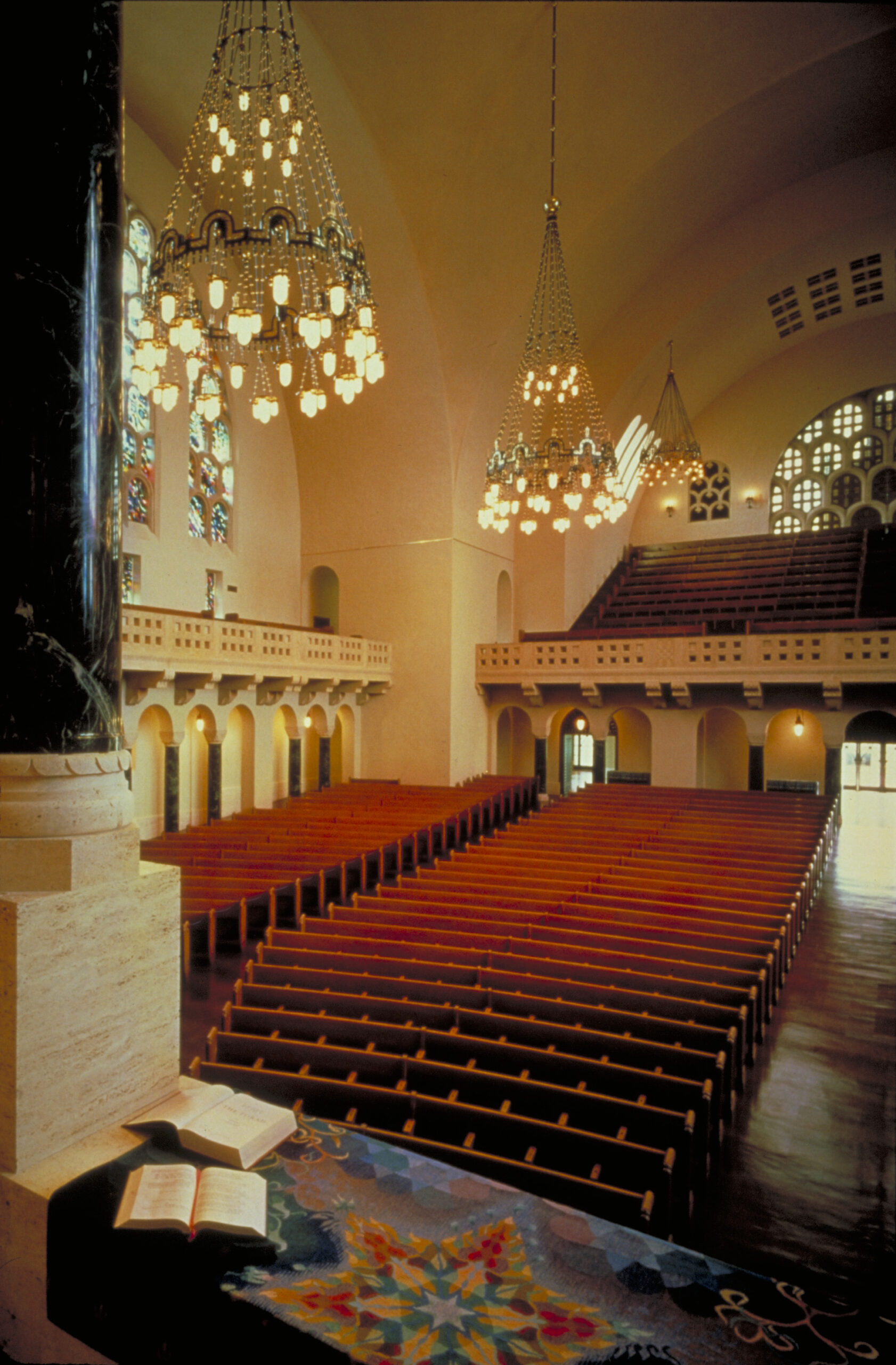 The historic chandeliers and sconces were rewired, relamped and cleaned. Temple Emanu-El, San Francisco, California © Chas McGrath