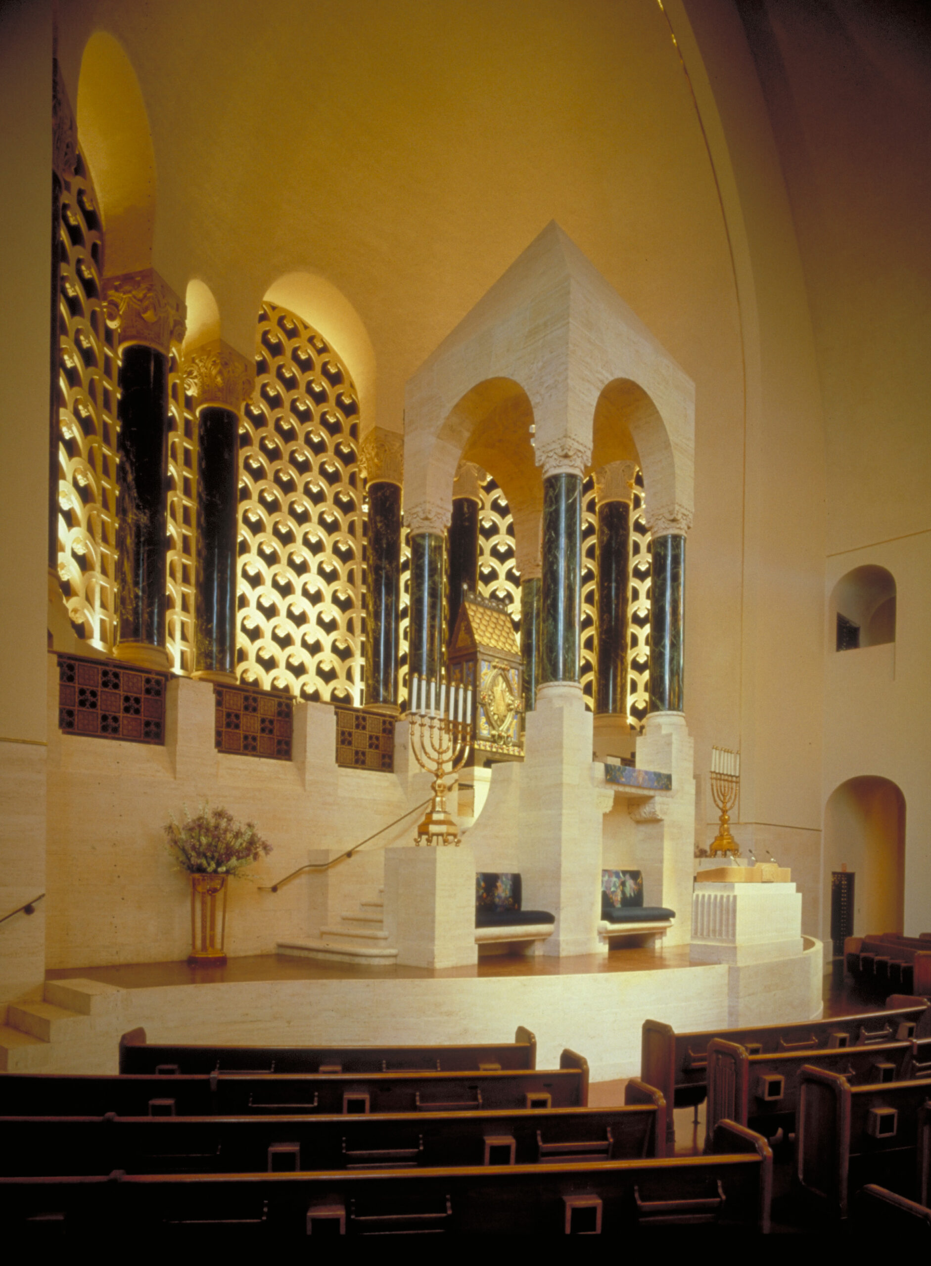 Downlight is concealed in the bimah to light the arc, and concealed uplight washes the decorative grill. Temple Emanu-El, San Francisco, California © Chas McGrath