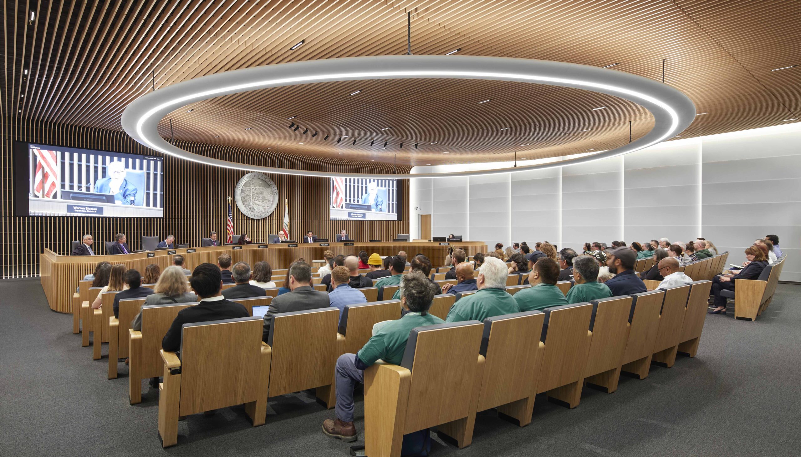 Net-zero-energy Board Chambers at the heart of San Mateo County Headquarters, designed for openness, sustainability and public inclusion.