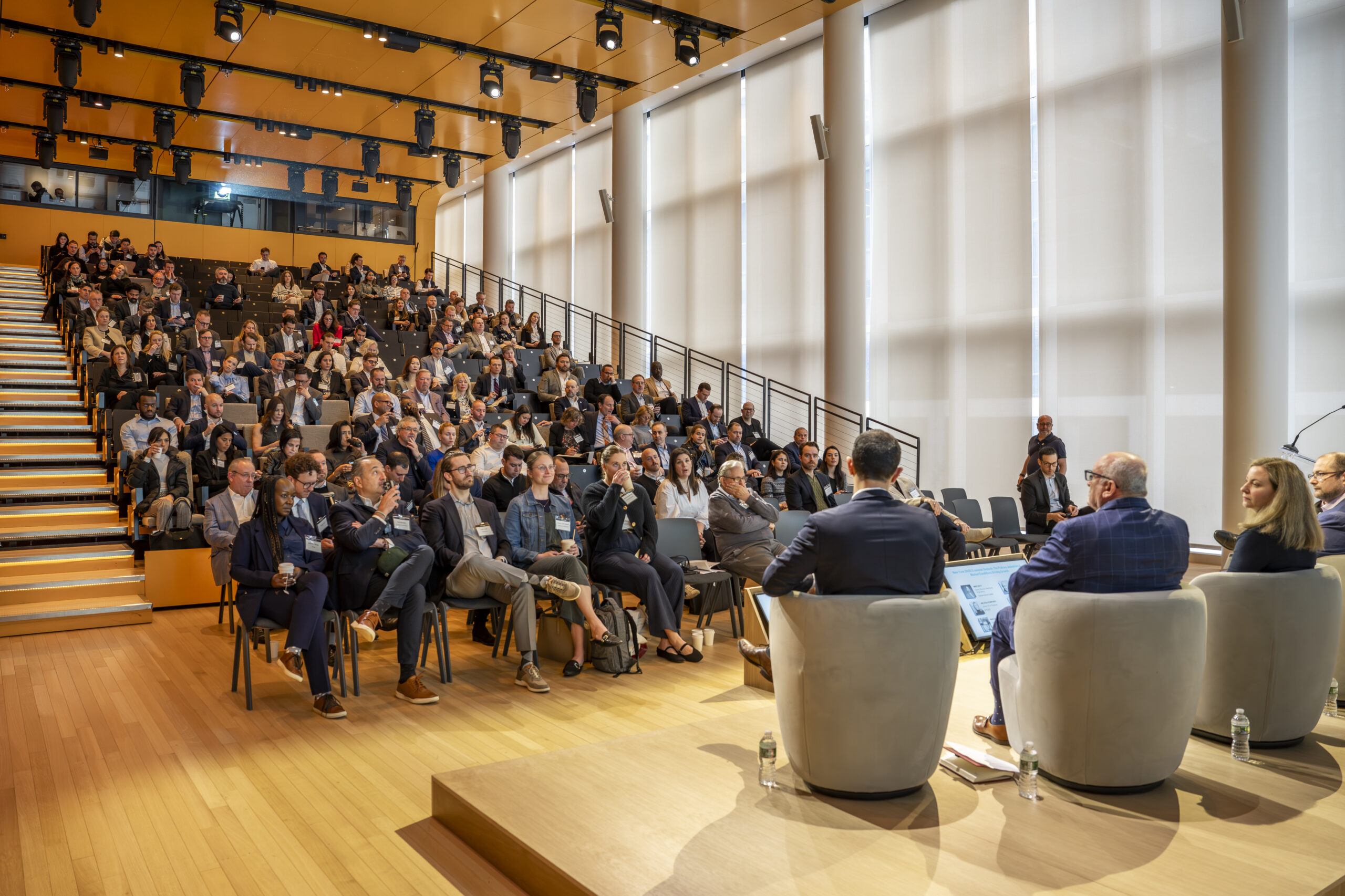 PENN 2 Town Hall arranged for a keynote talk, highlighting adaptable seating and multimedia capabilities. Keynote Setup, Conference Space, Multi-Use Auditorium, AV Systems.