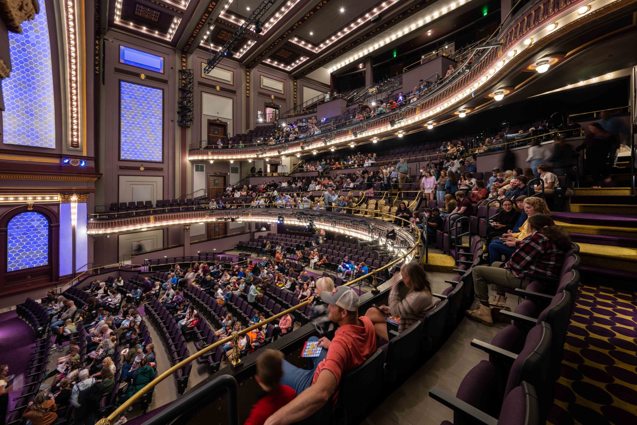 Restored historic light fixture at The Children’s Theatre of Cincinnati, retrofitted with energy-efficient LEDs to preserve the theatre’s original electric lighting glow.